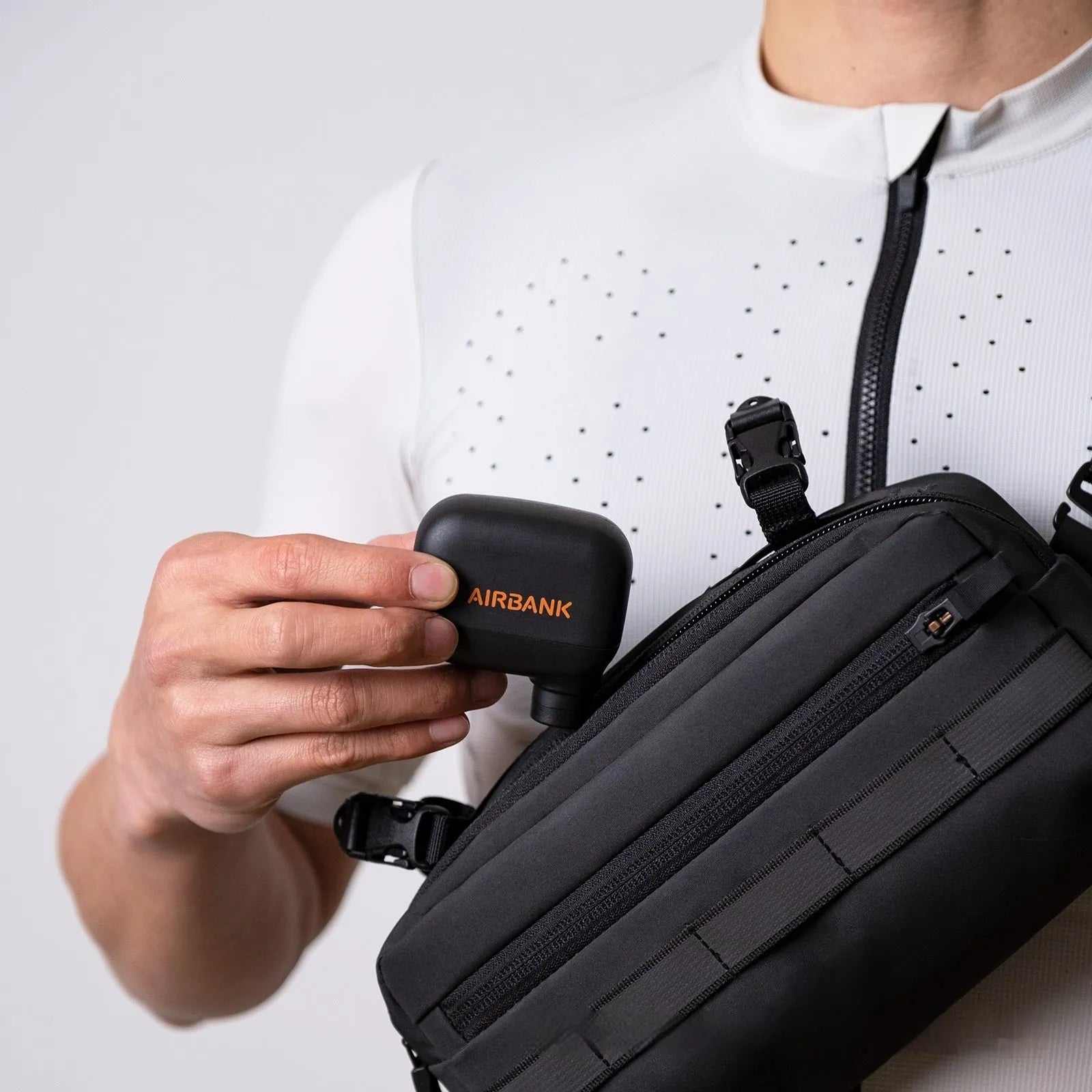 Black AS100 mini electric bicycle pump with USB cable and waterproof storage bag