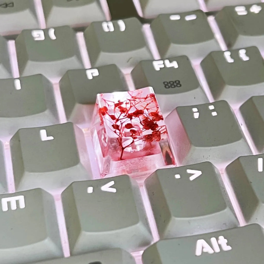 Resin starry sky keycap for mechanical keyboards in transparent design with glitter particles