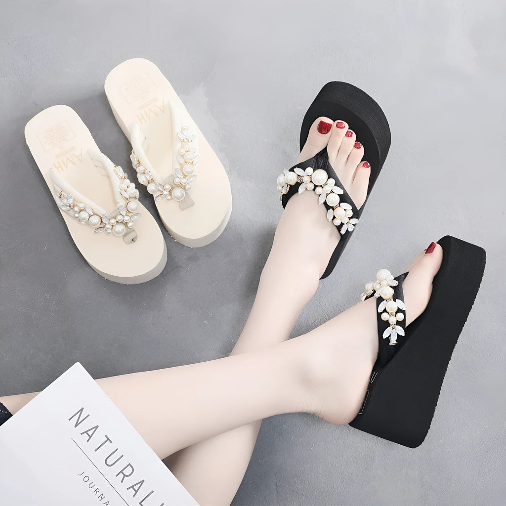 Women's high-heeled flip-flops in beige and black with cotton cloth upper.