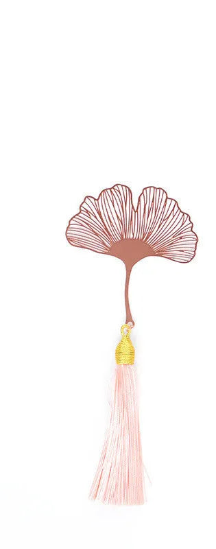 Brass metal bookmark with hollow-cut leaf design and a rose gold tassel.