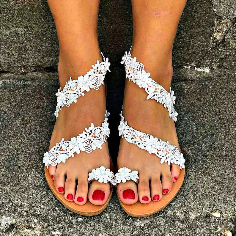 White women's flat shoes with rhinestone floral patterns and round toe design