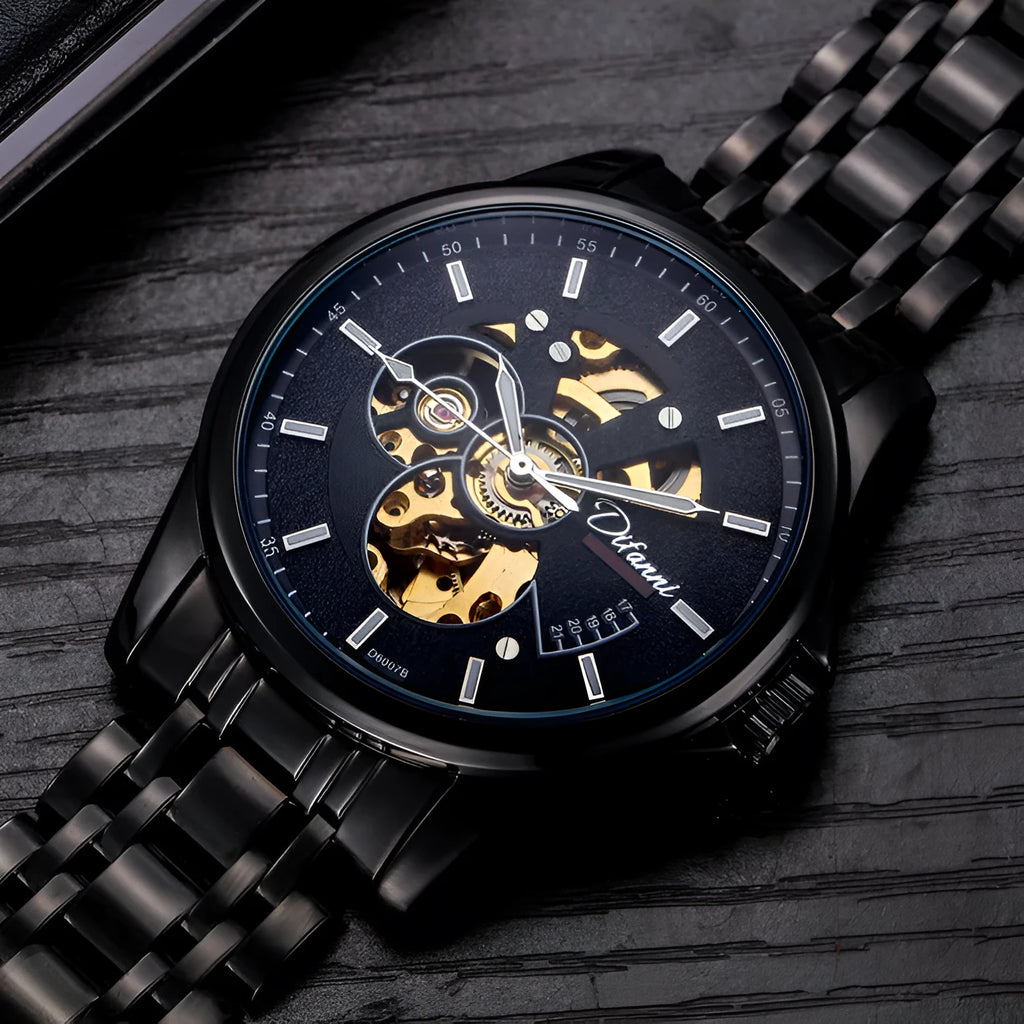 42mm automatic mechanical watch with stainless steel strap, butterfly buckle, round dial, and transparent case bottom