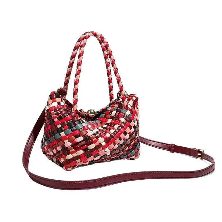 Colourful handmade woven women's PU leather shoulder bag shown from the front.