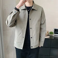 Man wearing a lightweight grey single-layer Korean-style jacket for spring or autumn.