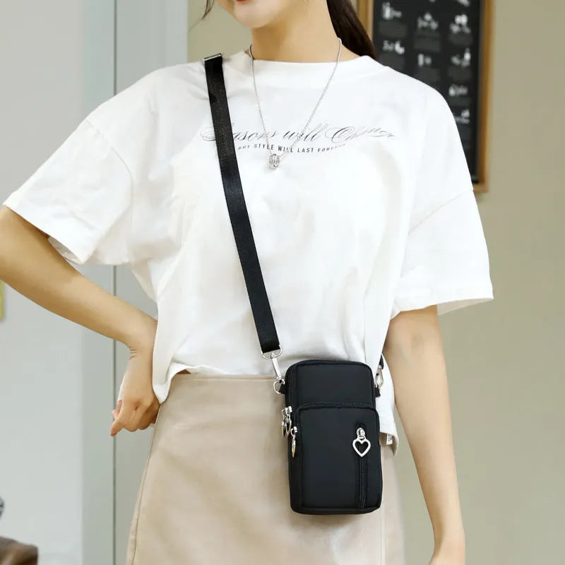 Nylon mobile phone crossbody bag for women, large size, available in multiple colours with zipper closure