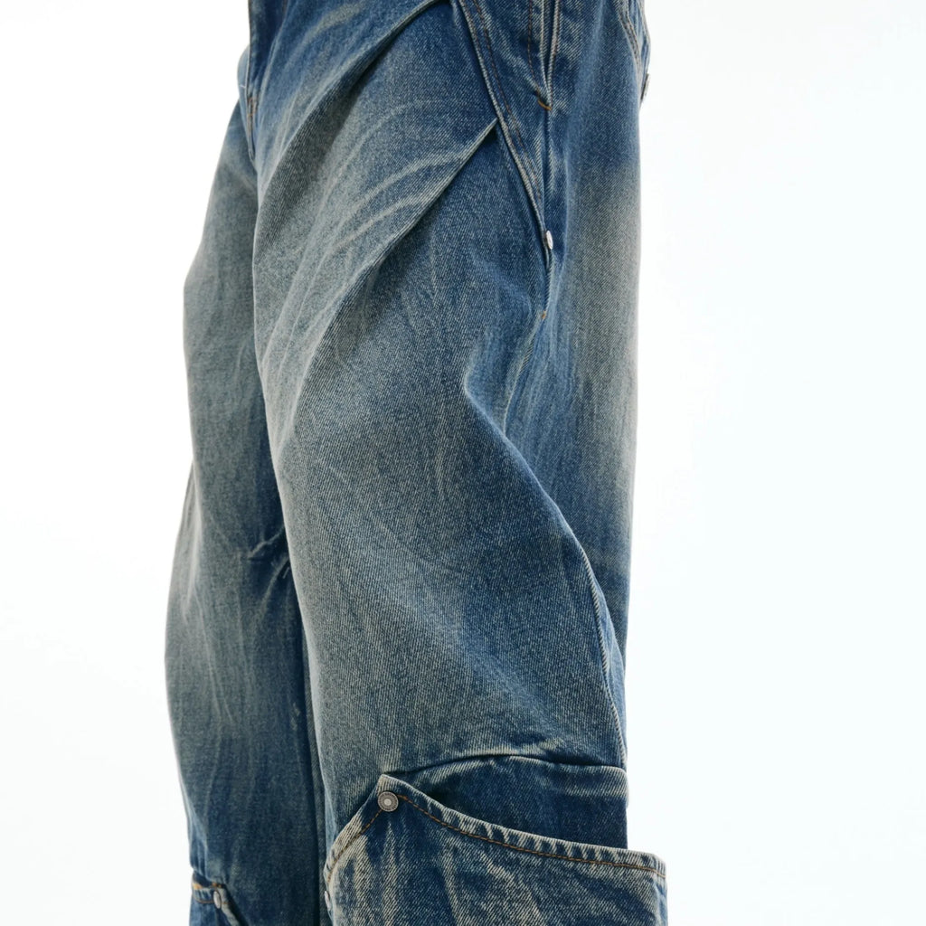 Men's verdant blue jeans with retro washed burst pattern and curved knife design in loose fit