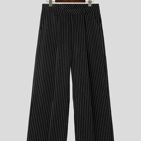 Man wearing black vertical striped pleated casual trousers with an elasticated waistband.