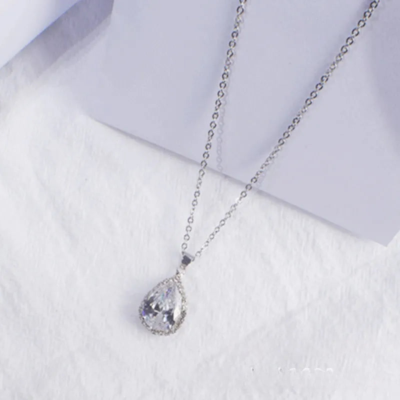 Rose gold water drop necklace with geometric rhinestones in pink colour