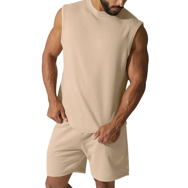 Men's sleeveless cotton blend sports set showing top and shorts in a solid colour.