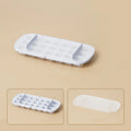Food-grade plastic ice cube tray with grid, ice shovel, and storage compartment in blue colour.