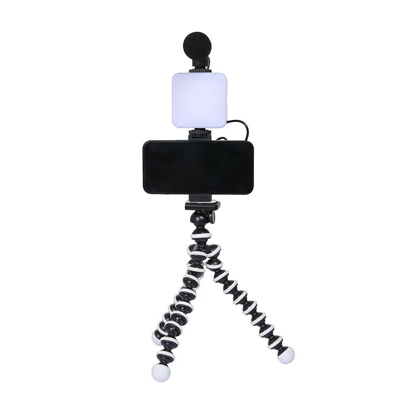Small square universal camera flash unit with hot shoe mount and rotatable head.