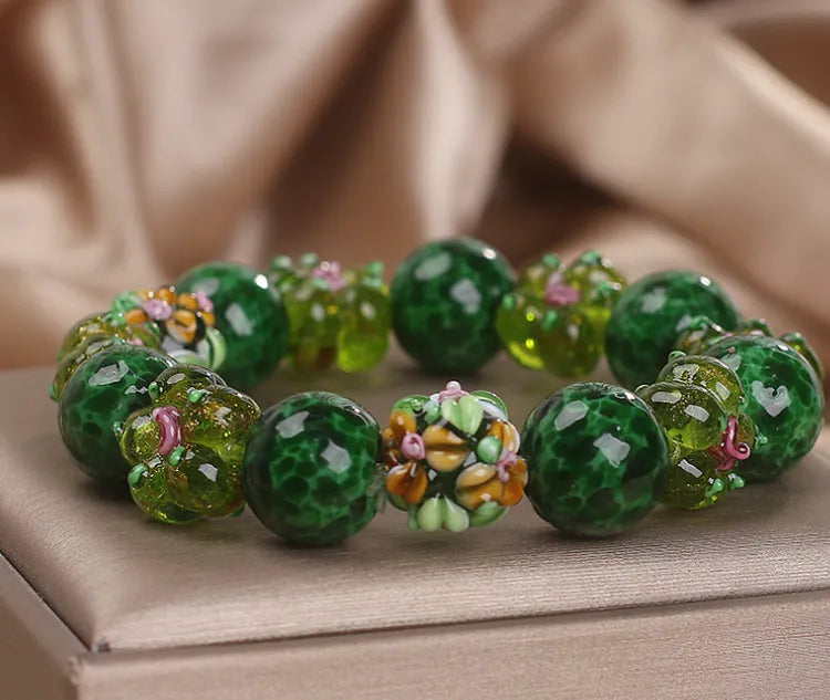 Chinese ancient flower glazed bracelet for women, green electroplated finish with floral charm