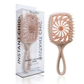 Whirlwind hollow hairdressing comb in dark purple made from ABS and TPEE materials over 20cm long