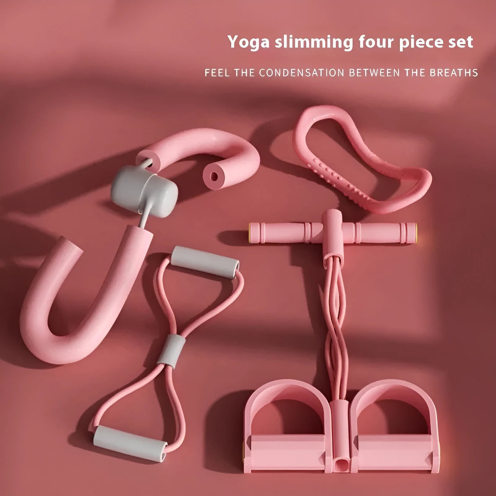 Yoga four piece set showing leg stretcher, yoga ring, pedal tension device and figure eight rope