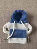Polyester knit hooded cover stretched over a car manual gear lever in a red and white colour combination.