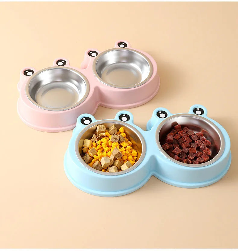 Blue stainless steel double pet bowl with frog design for cat and dog food and water.