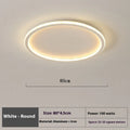 Modern minimalist circular LED ceiling lamp in black finish with integrated lights, shown in a bedroom setting.