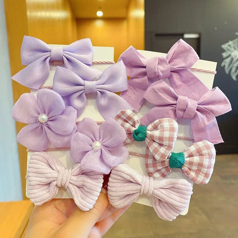Fabric hair bow set for children with bow flower pattern in multiple colours