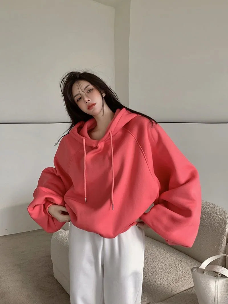 Women's loose hooded mulberry silk sweater in watermelon red colour with sleeveless design