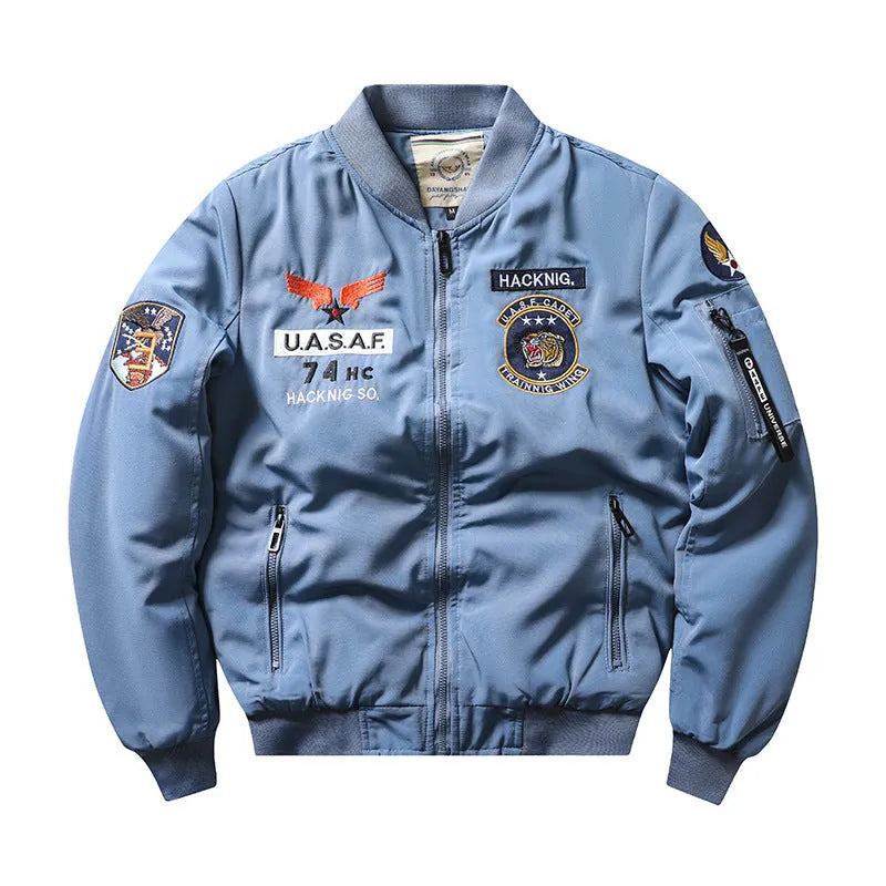 Men's slim-fit retro motorcycle coat in blue with stand collar, embroidery, and chest patch pockets.