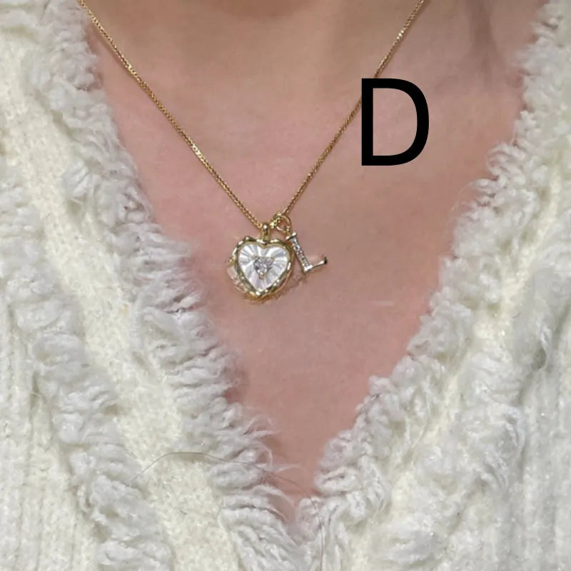 Mixed material pendant necklace for women, heart shaped and geometric designs, regular chain, colour options A-M.