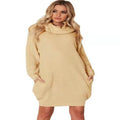 Light apricot coloured mid-length pullover sweater with a lapel collar and side pockets on a model.