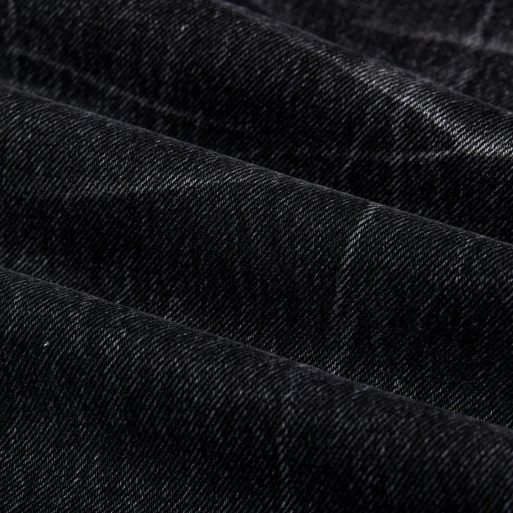 Men's black straight-leg jeans with a lightning crack wash pattern on cotton denim.
