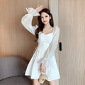 White women's long sleeve chiffon patchwork dress with a waist-slimming fit and long skirt.