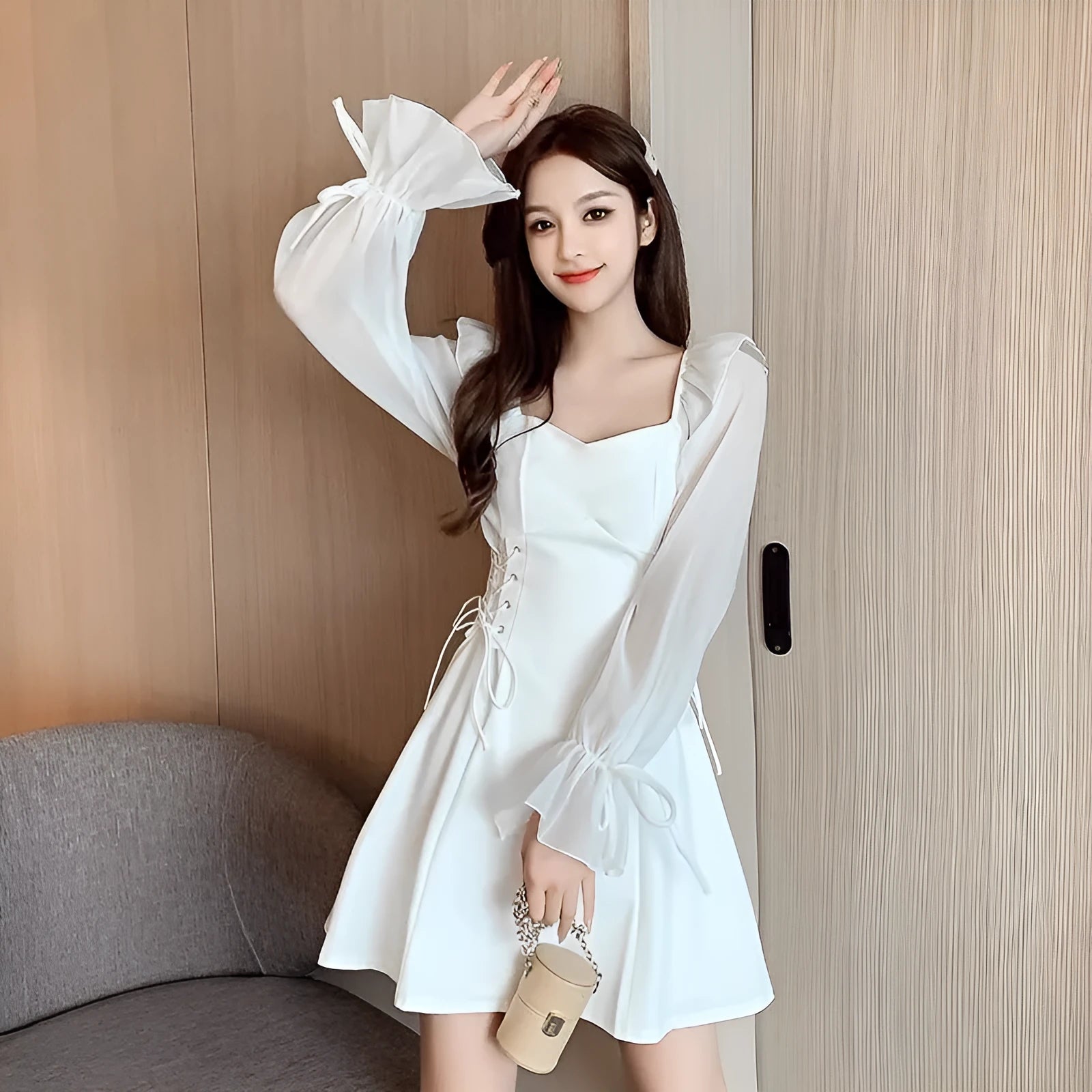 White women's long sleeve chiffon patchwork dress with a waist-slimming fit and long skirt.