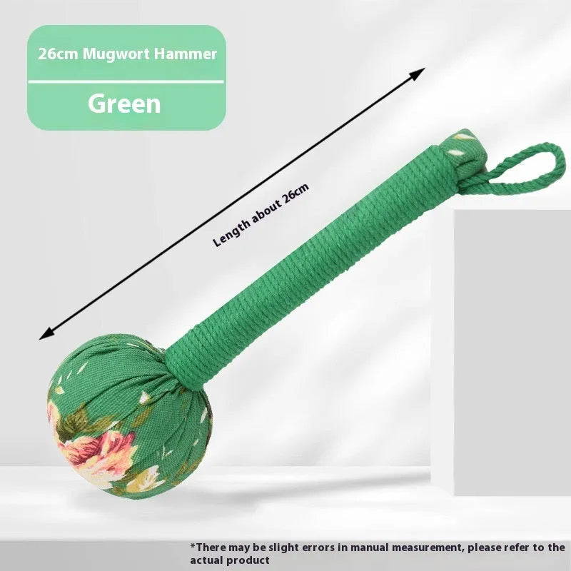 Argy wormwood massage hammer in green colour showing hand-held design for neck and shoulder massage