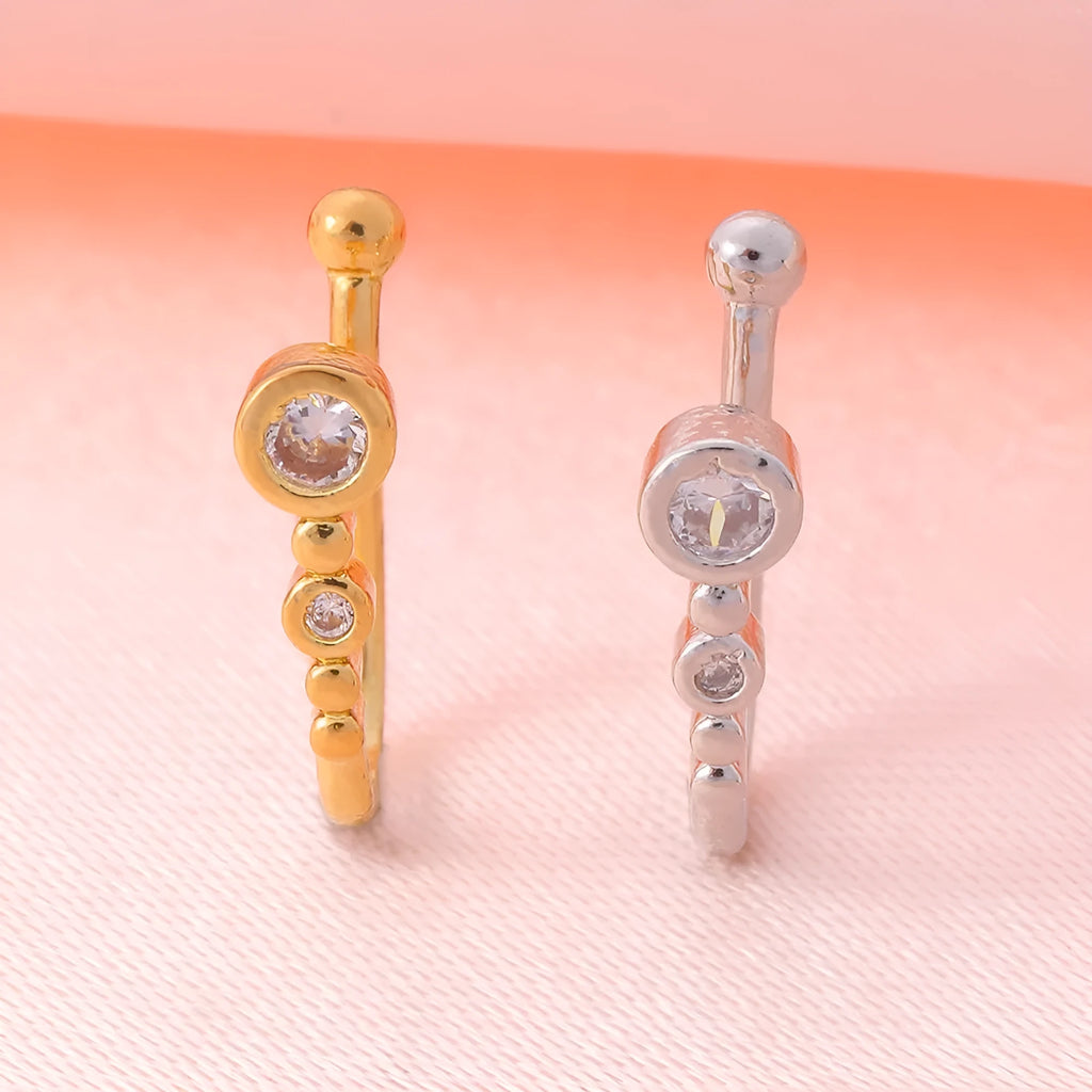 Copper U-shaped nose ring with zircon micro inlay, white K electroplated finish, shown on a flat surface