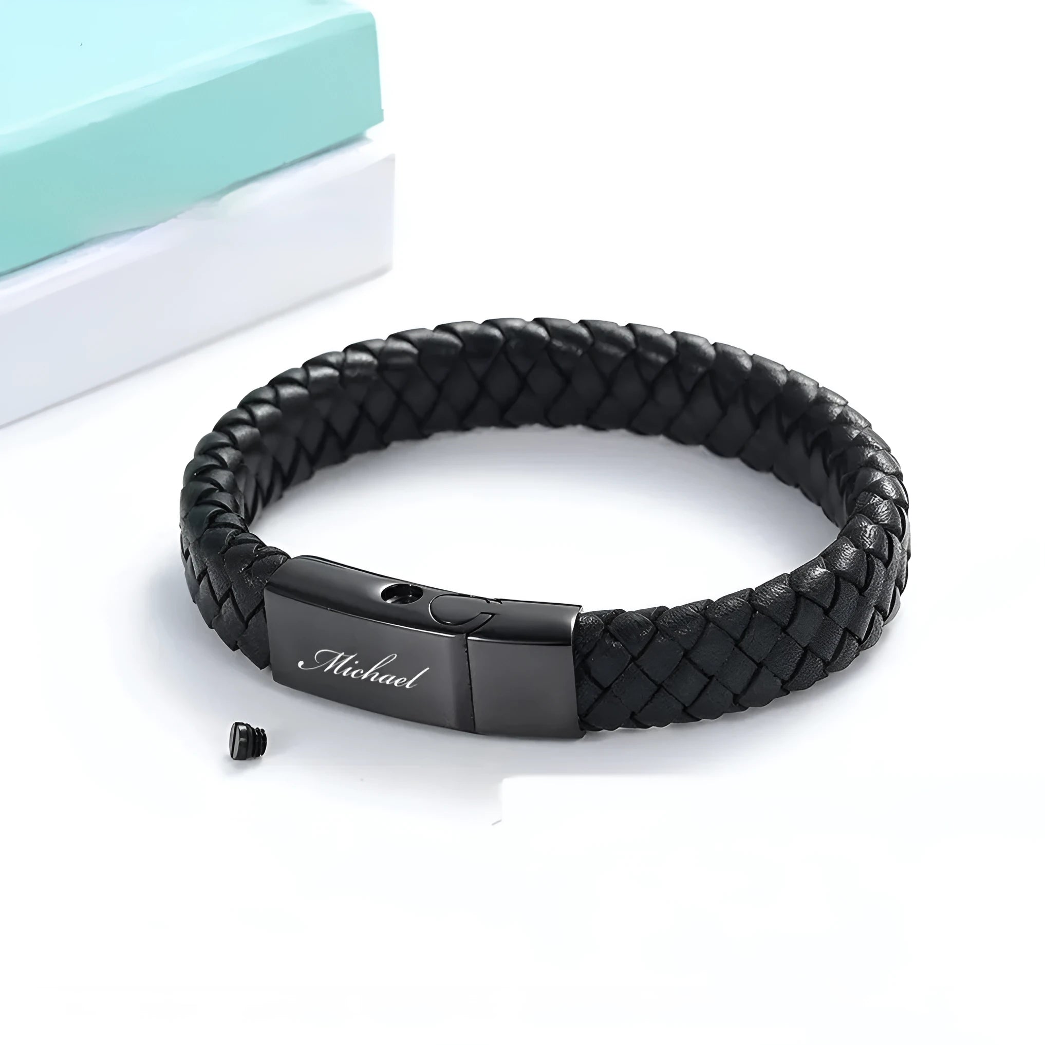 Black stainless steel memorial bracelet with leather weaving and engraved text