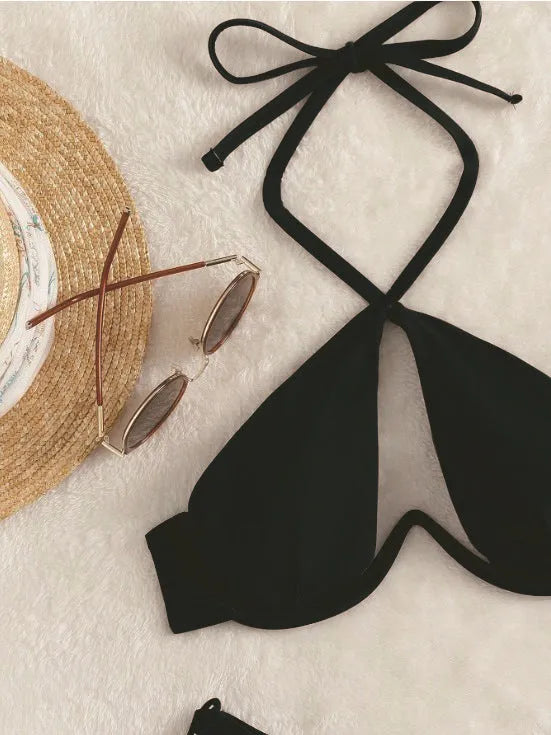Women's solid colour halter neck bikini set on a mannequin, shown in brown.