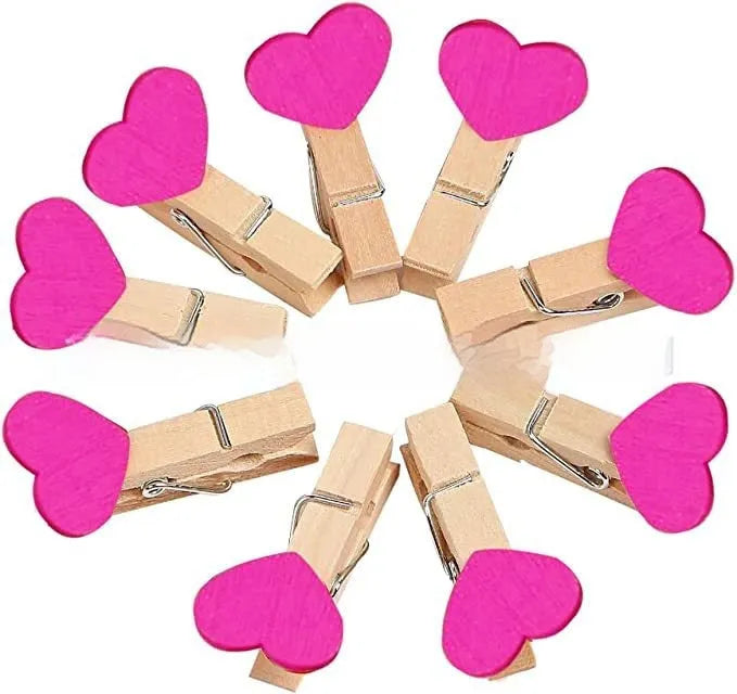 Set of five wooden heart-shaped clips in red, white, pink, yellow, and rose red colours.
