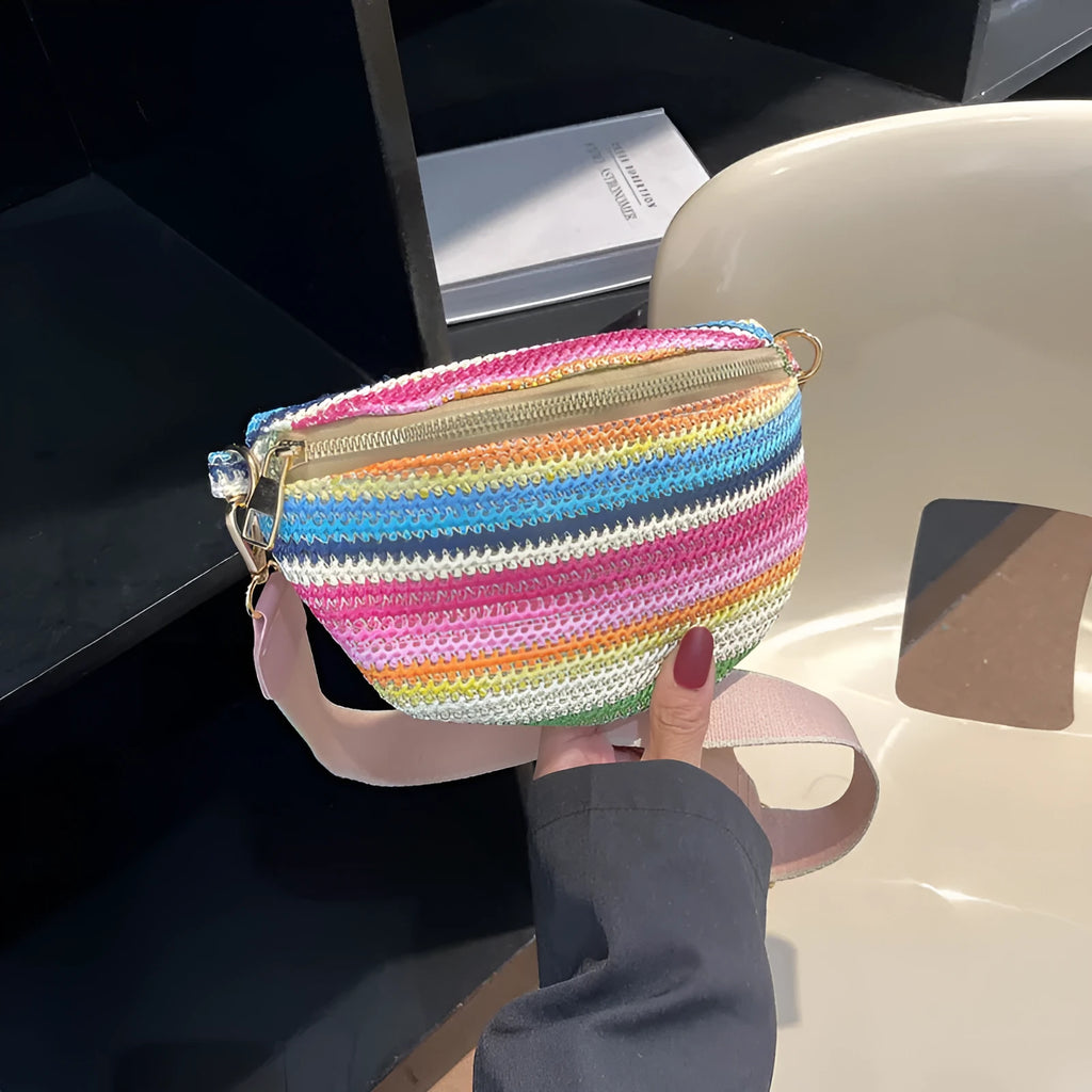 Bohemian style straw women's shoulder bag with shell shape and single strap in pink or blue colour