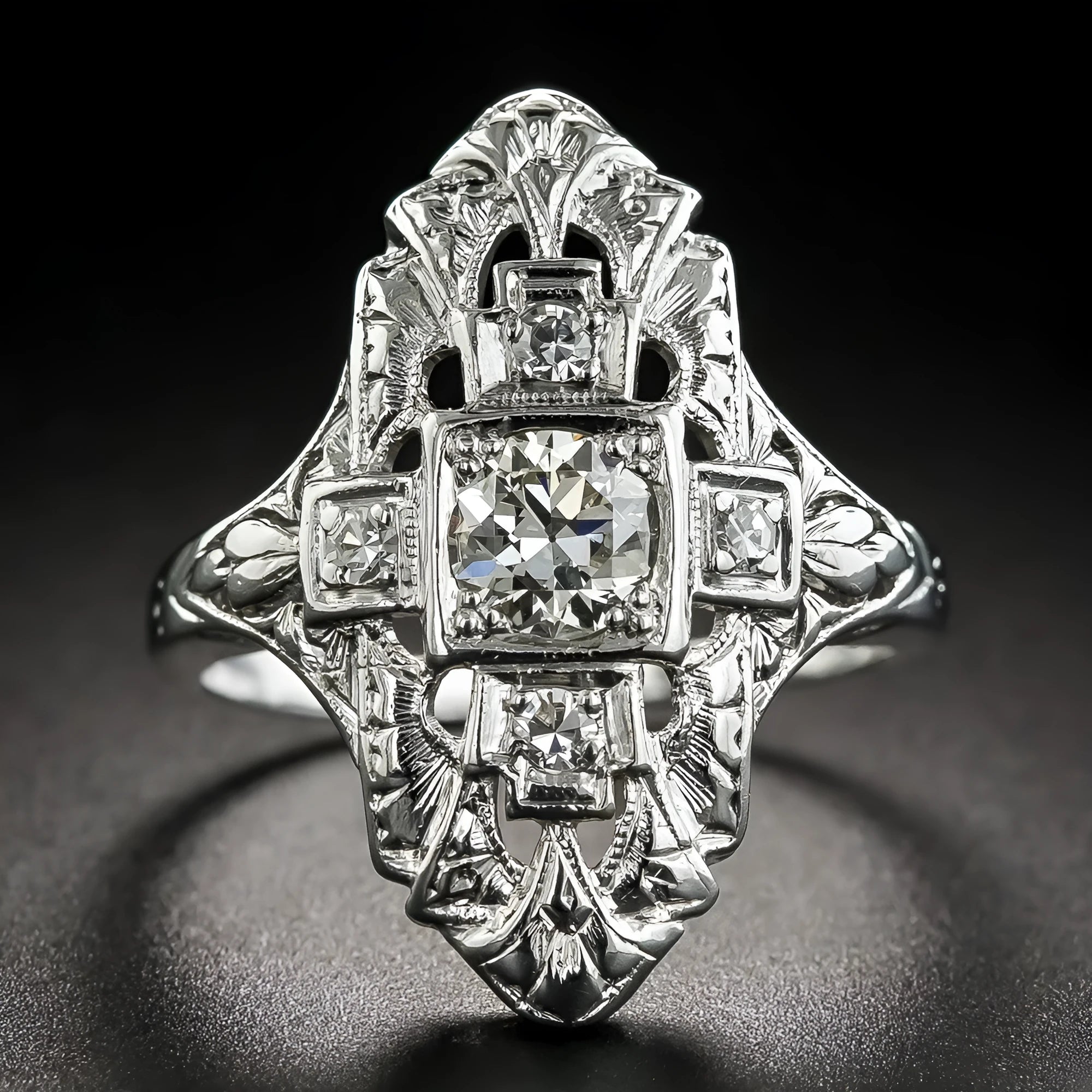 Geometric hollow out silver ring with diamond-studded details on copper construction