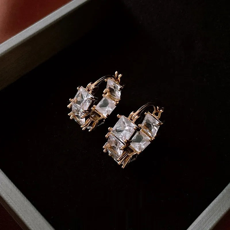 Women's gold-tone copper U-shaped geometric earrings with micro-inlaid zircon