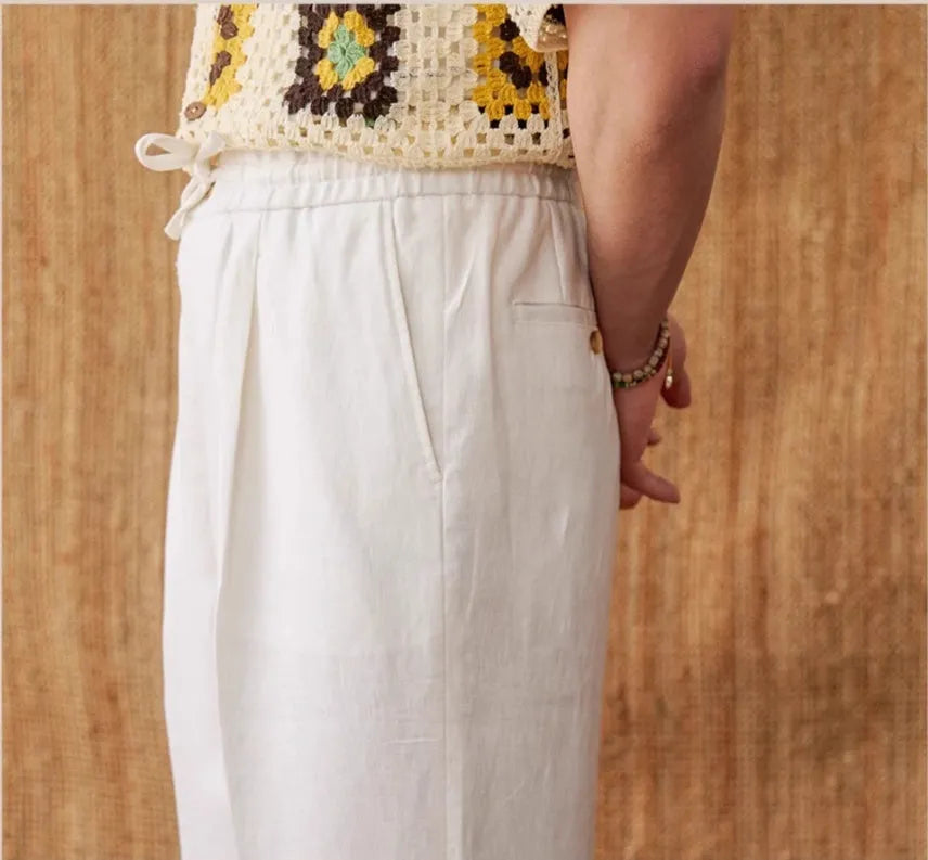 Linen straight-leg trousers with elasticated high waist and lace detail in greige colour.