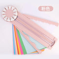 Pink and black 12-in-1 manual plastic paper cutting machine on a white background.