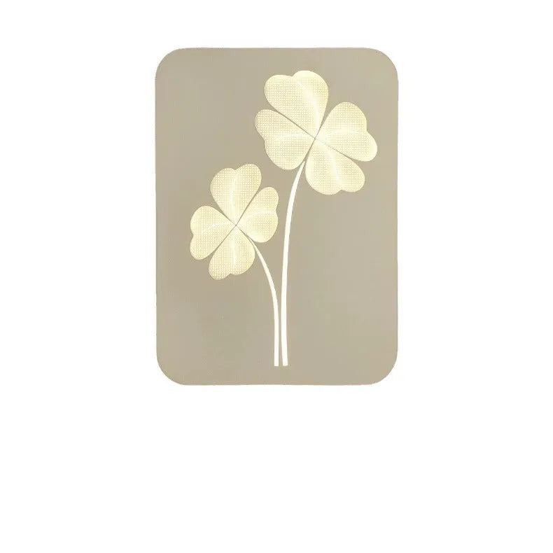 Modern bedside wall lamp with acrylic shade in six designs: white or pink square four-leaf clover, round ginkgo leaf, and round love heart.