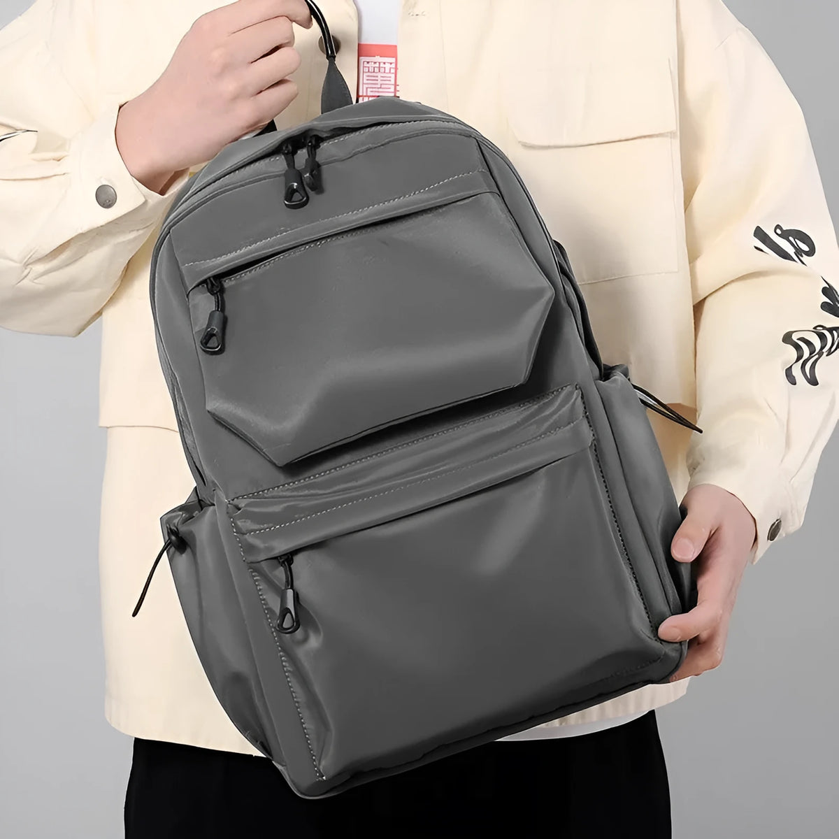 Blue Oxford cloth student backpack with anti-theft design and USB charging port, side view