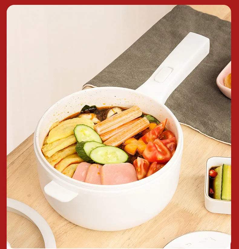 White electric cooking pot with 20cm mouth, 7cm depth, 700W mechanical control, on a dormitory desk