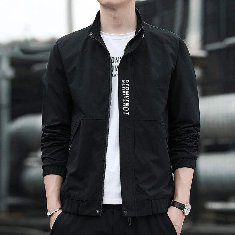 Men's black stand collar casual sports coat made from polyester fabric on a hanger.