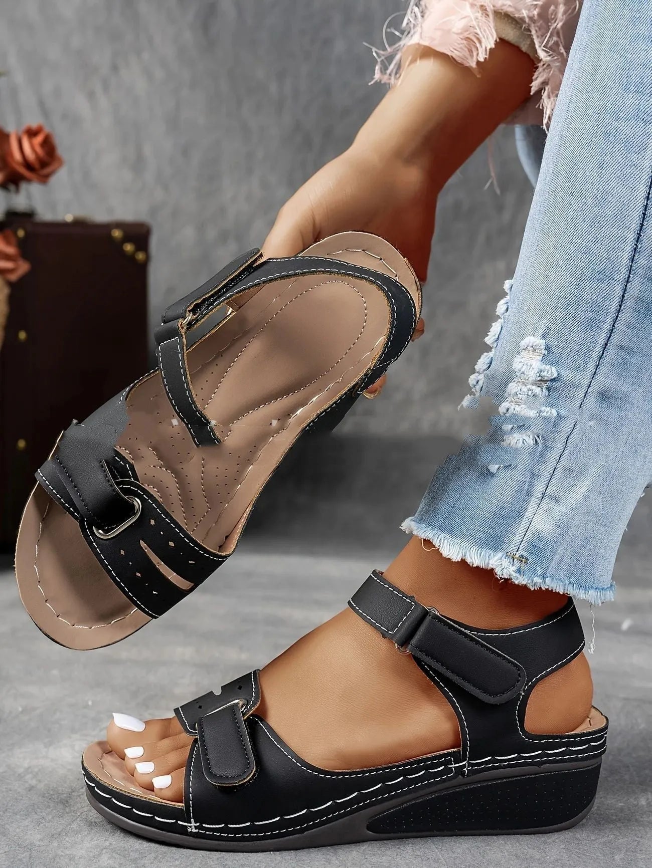 Women's beige strap sandals with a thick composite sole and adjustable Velcro fastening.