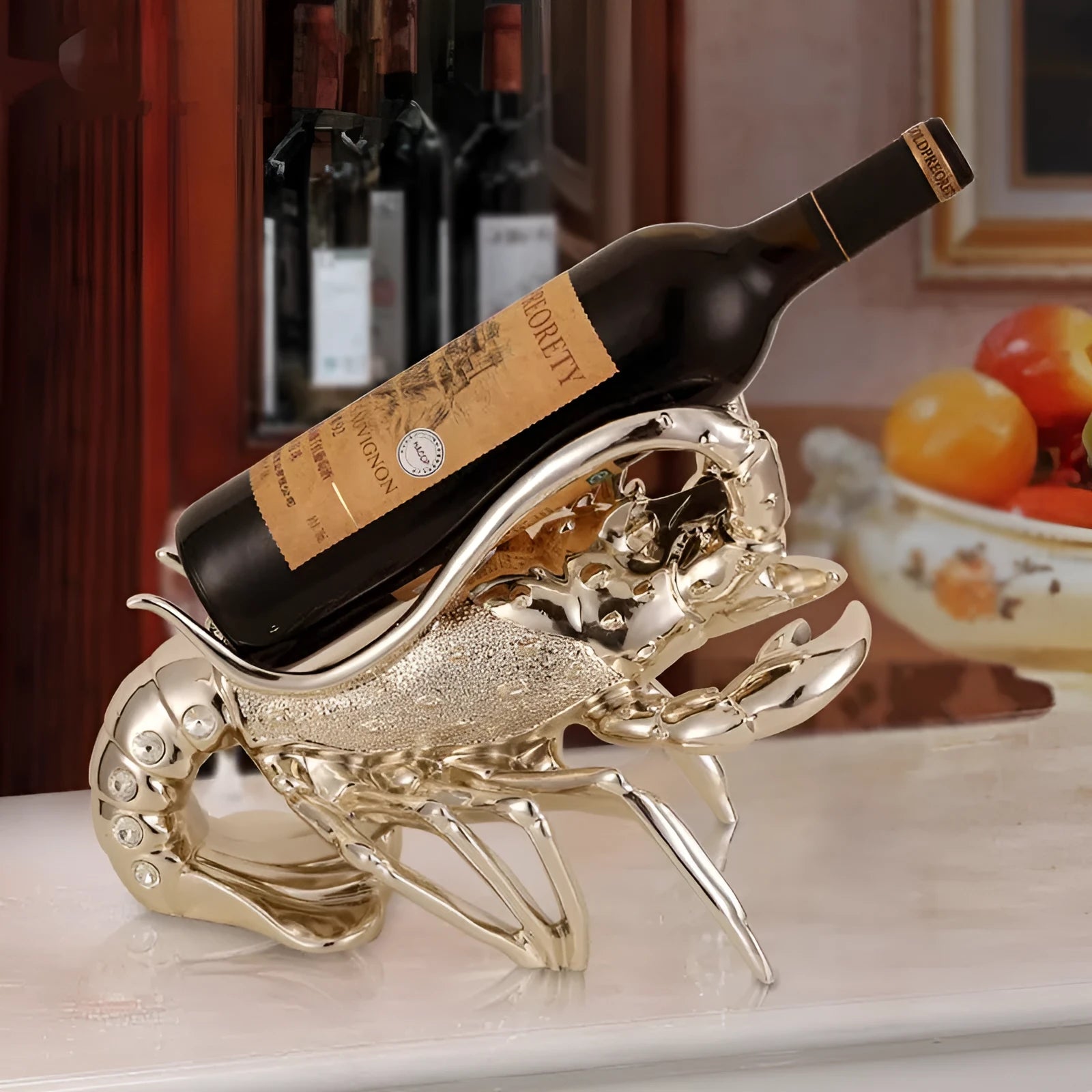 Lobster-shaped wine rack ornament in rose gold or silver holding a wine bottle