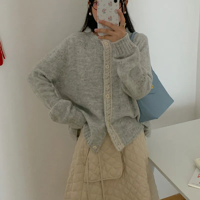 Artistic retro Korean loose fit cardigan coat in viscose fibre, shown in apricot colour.