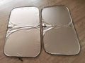 Titanium silver aluminium foil car sunshade for windscreen heat and UV protection.
