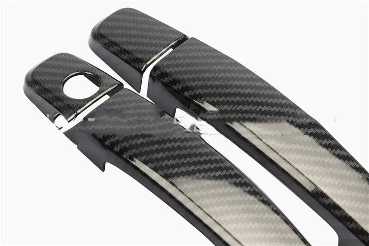 Carbon fibre pattern door handle cover for Opel Vauxhall Astra H and J models 2004 to 2015.