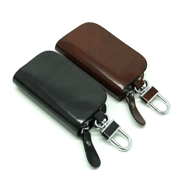 Genuine cowhide leather car key case with frosted finish showing black and brown colour options