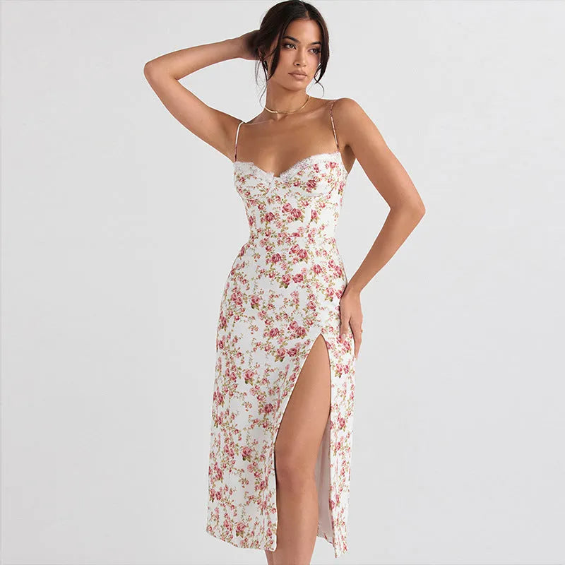 Women's blue lace flower print long dress with a thigh slit and thin suspender straps.